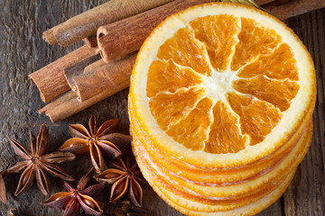 cinnamon sticks, anise stars and slices of dried citrus