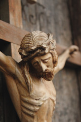 Fototapeta na wymiar Jesus Christ crucified (an ancient wooden sculpture)