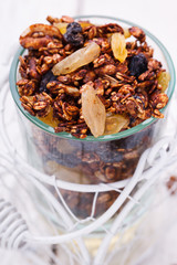 Granola, honey, raisins, peanuts and sunflower seeds.