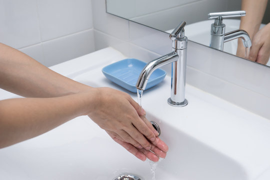 Washing of hands with soap under running water 1