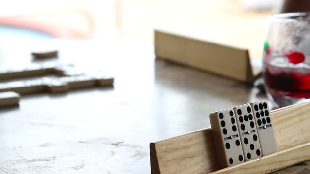 Game of dominoes played; close up