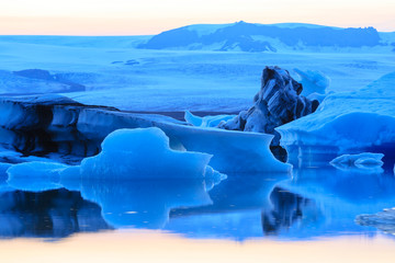 Jokulsarlon, Iceland - Melting icebergs from vatnajokull glacier floating in Jokulsarlon lagoon.