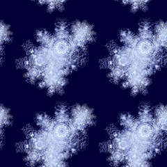 Abstract dark blue winter background with snowflakes and ice flowers
