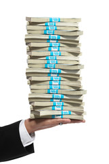 Hand of a business man holding a tall stack of money