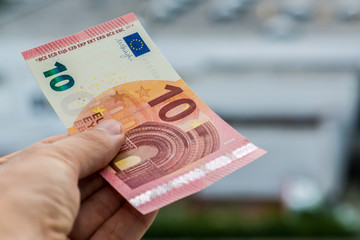 Man giving euro money