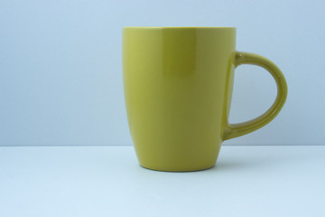 Simple yellow mug for drink