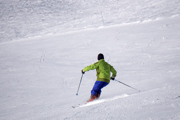 Fototapeta na wymiar Skier on the ski piste