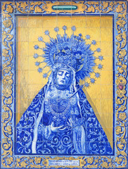 CORDOBA, SPAIN - MAY 27, 2015: The ceramic tiled, cried Madonna by J. Rodroguez Ritton on the Cueste del Bailio street.