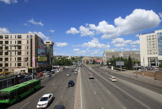 KRASNOYARSK, RUSSIA - JULY 16, 2013: View of Veinbaum street from a pedestrian bridge