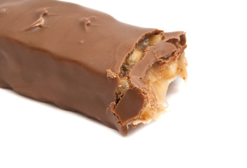 half of sweet chocolate bar on white