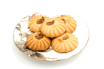 cookies on plate on white