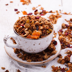 Granola from several types of cereals with nuts,honey,raisins