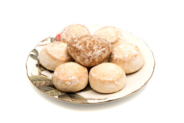 some gingerbreads on a dish