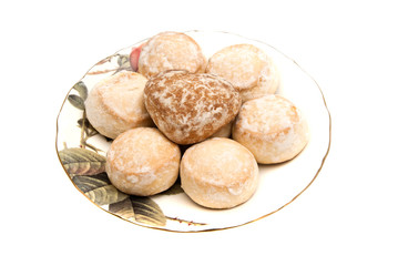 some gingerbreads on glass plate