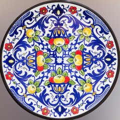 CORDOBA, SPAIN - MAY 26, 2015: The detail of ceramic plate from the market.