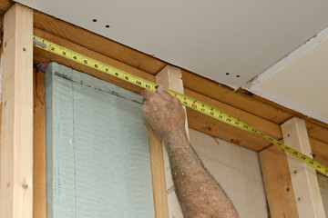 Worker Measuring Frame for Insulation