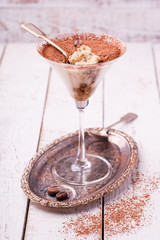 Tiramisu, traditional Italian dessert in a glass