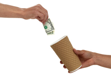 Hand giving money to a cup being held out