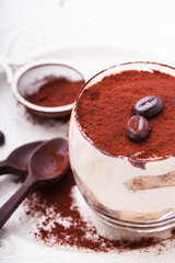 Tiramisu, traditional Italian dessert in a glass