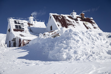 Mountain shelter on top of the hill