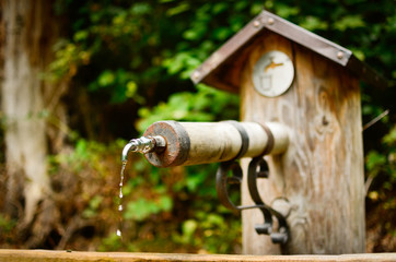 water drops from a tap