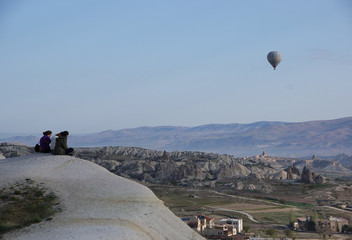 Balloon flies over mountains