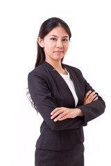 confident asian businesswoman crossing her arms