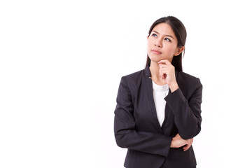 serious businesswoman thinking, looking up