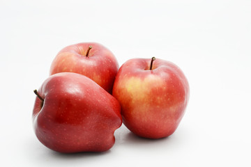 red apple on white ground