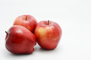 red apple on white ground