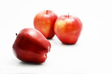 red apple on white ground