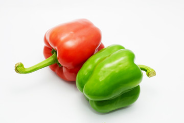 red and green bell pepper on white background