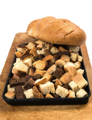 Bread and croutons on a baking sheet