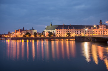 Odra river waterfront in Wroclaw, Poland, with university church and main university building, in early morning, seen from Malt Island (Wyspa Slodowa)