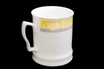 White cup on a black background