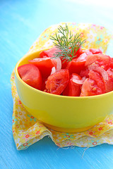 salad of tomatoes and onions, dressed with vegetable oil
