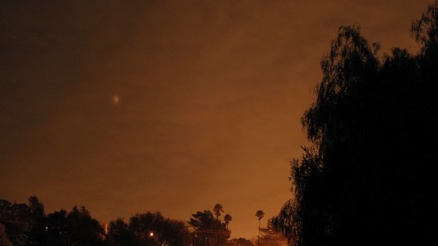 Time lapse of full moon total lunar eclipse getting bright in Oak View, California.