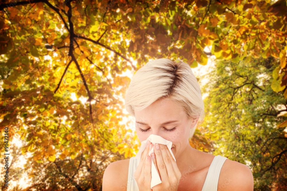 Poster Composite image of sick woman blowing her nose