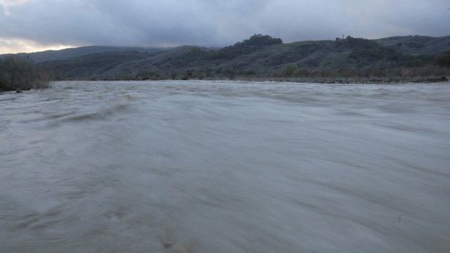Time lapse of the Ventura River flooding and a rain squall in  Oak View, California.