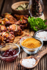 BBQ chicken wings with spices and dip