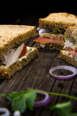 Sandwiches with chicken, sauce and vegetables