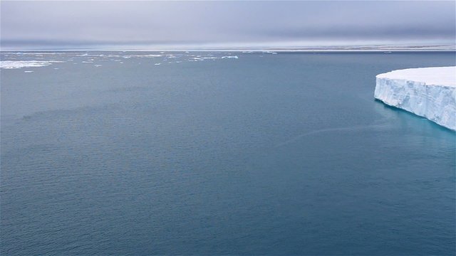 Panning the Brasvellbreen tongue of the Austfonna ice cap on Nordaustlandet in the Svalbard archipelago, Norway.