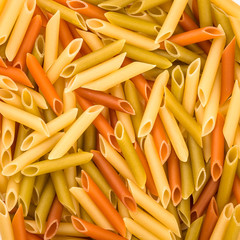 Pasta Penne colorata texture background 