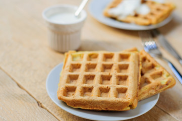 Zuccini hash brown waffles with sour cream
