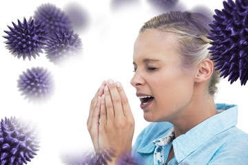 Composite image of blonde woman sneezing