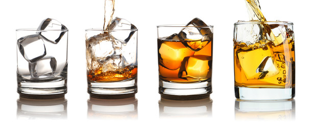 Whiskey in glass with ice set