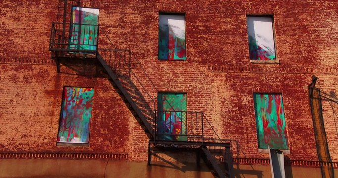 Buildings are painted with beautiful art in a Baltimore slum.