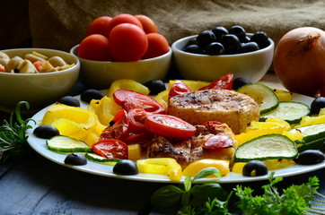 Grilled cheese and vegetable on rustic blue background