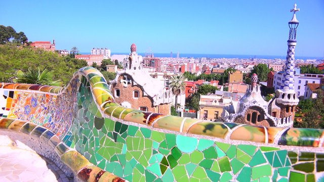The bright and colorful artwork of Gaudi in Park Guell, Barcelona, Spain.