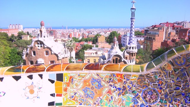 The bright and colorful artwork of Gaudi in Park Guell, Barcelona, Spain.